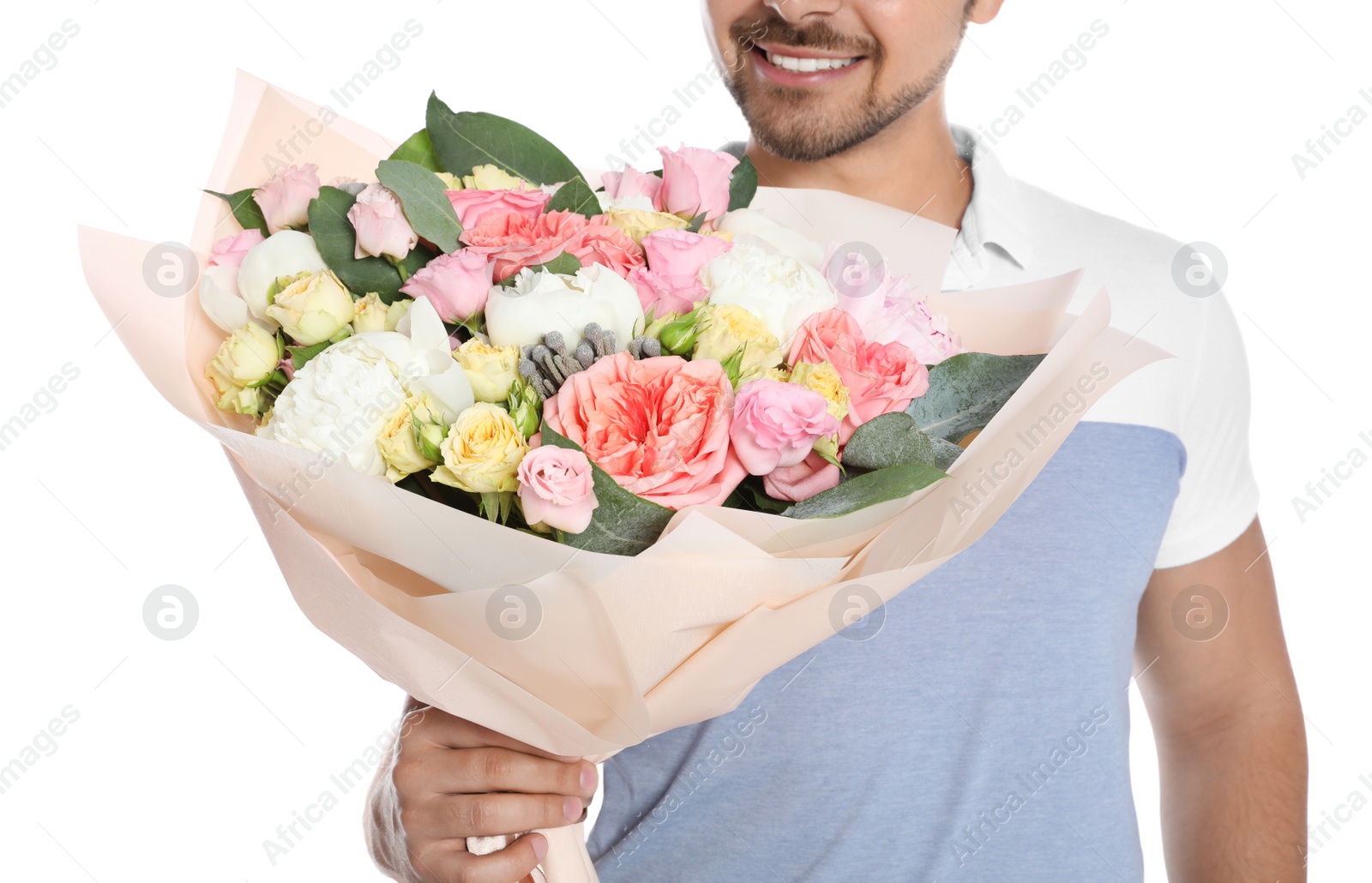 Photo of Young man with beautiful flower bouquet on white background, closeup view