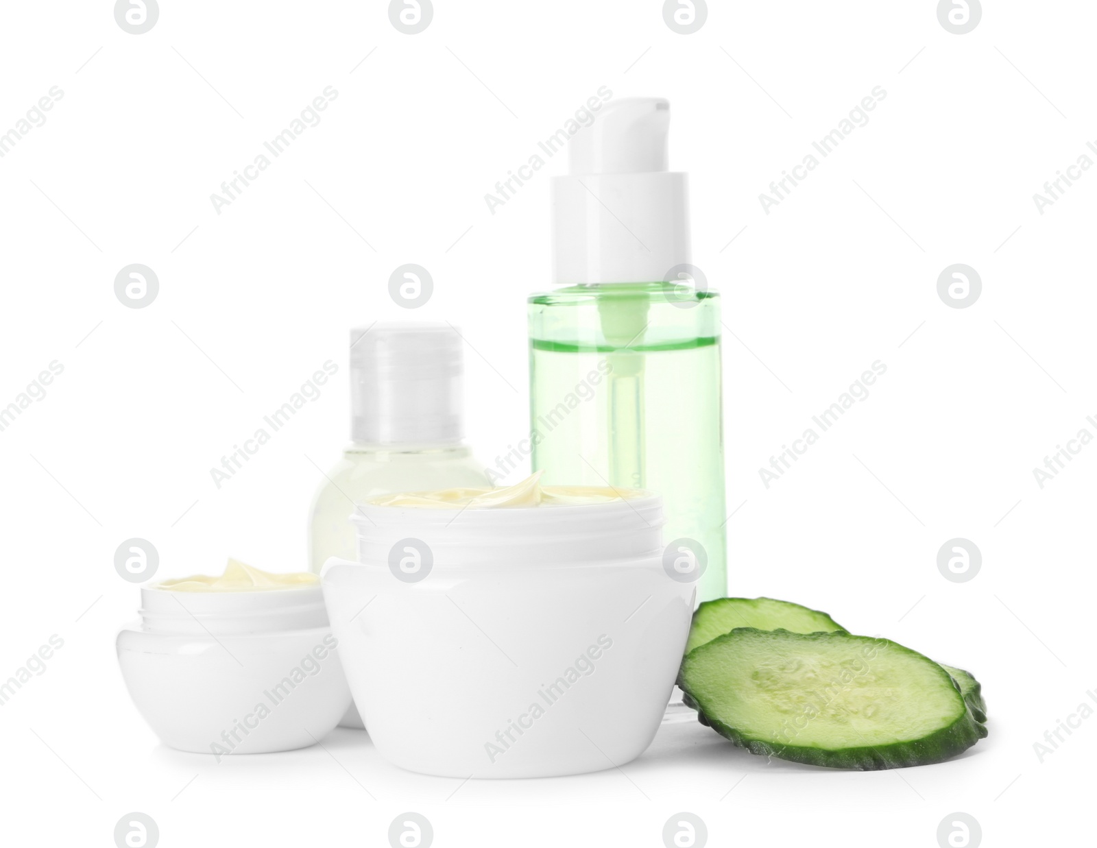 Photo of Jars with cream and bottles on white background. Hand care cosmetics