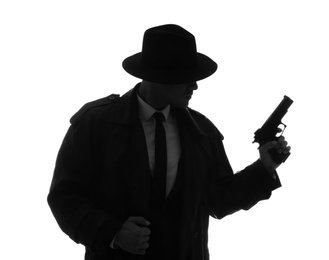 Photo of Old fashioned detective with gun on white background