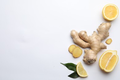 Photo of Fresh lemons and ginger on white background, flat lay. Space for text