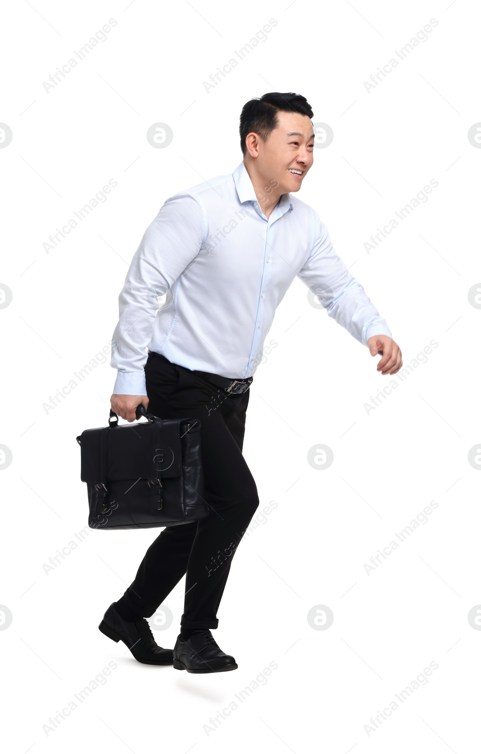 Photo of Businessman with briefcase running on white background