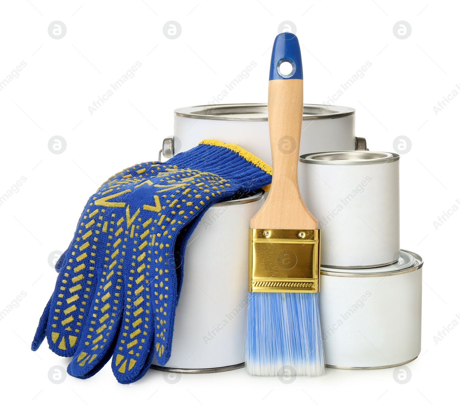 Photo of Closed blank cans of paint, gloves and brush isolated on white