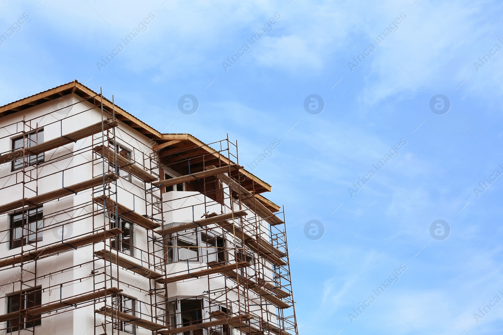 Photo of Construction site with unfinished building against sky