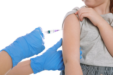 Photo of Little girl receiving chickenpox vaccination on white background, closeup. Varicella virus prevention