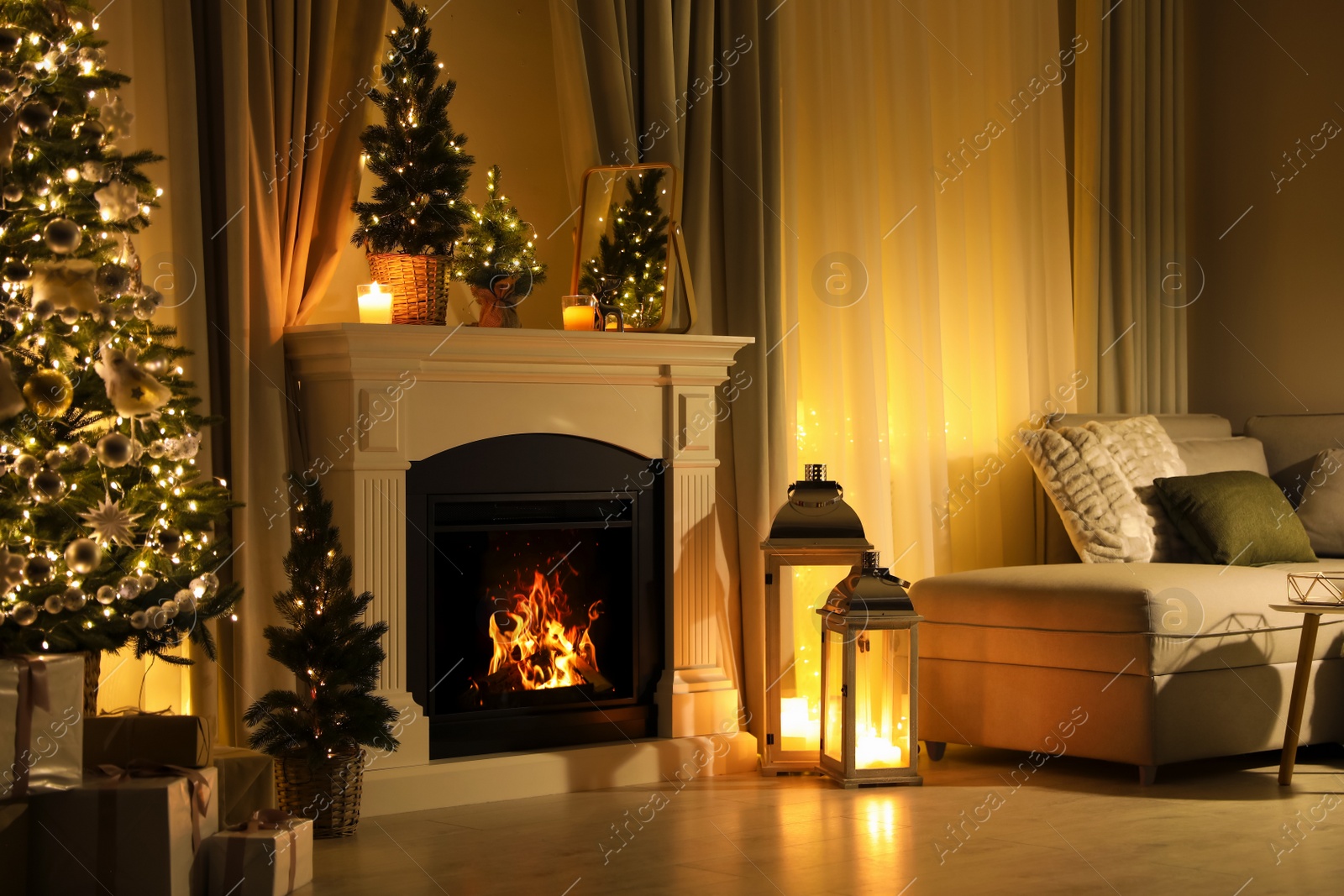 Photo of Stylish living room interior with beautiful fireplace, Christmas tree