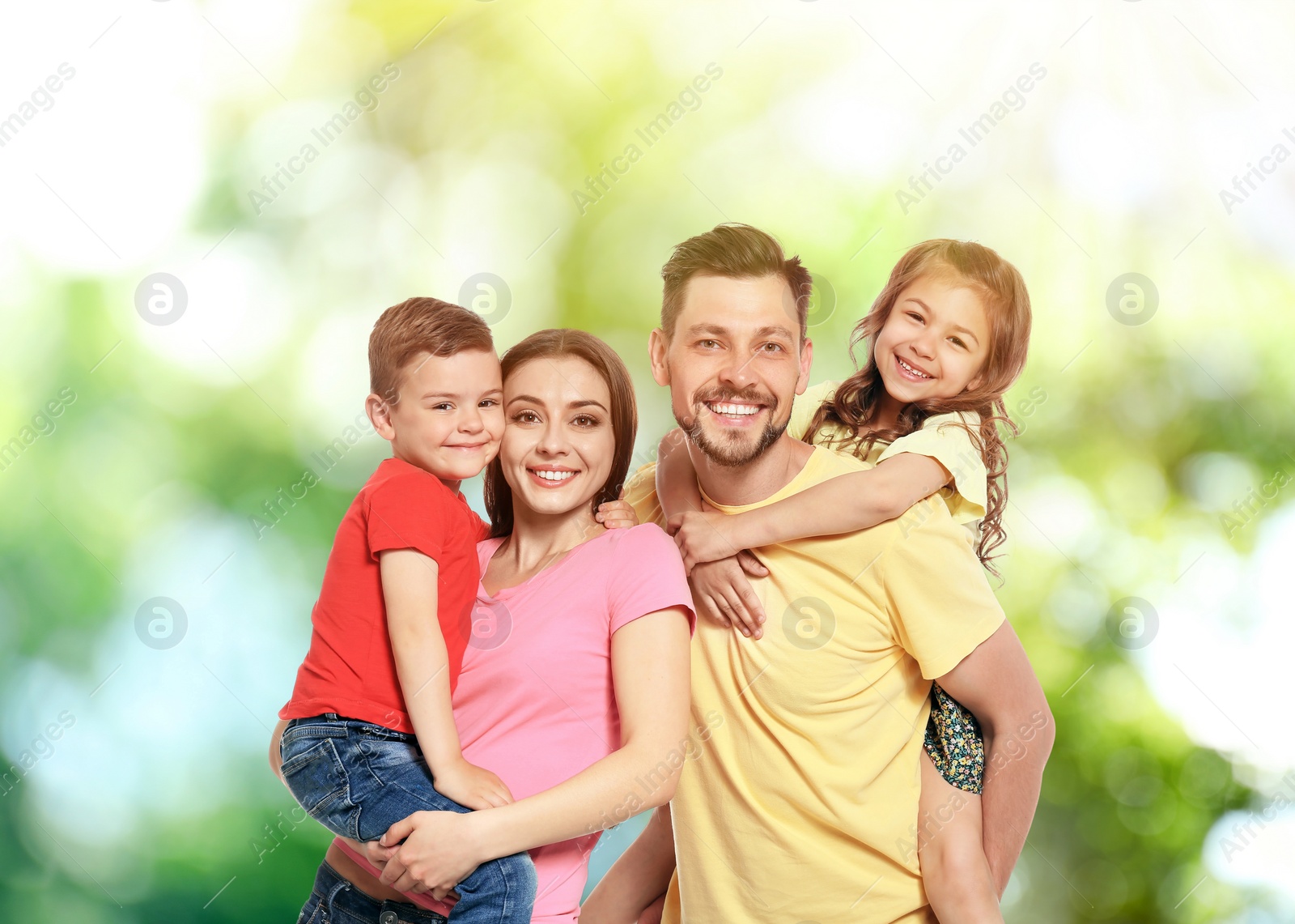 Image of Happy family with children outdoors on sunny day