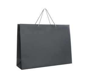 Photo of Black paper shopping bag isolated on white