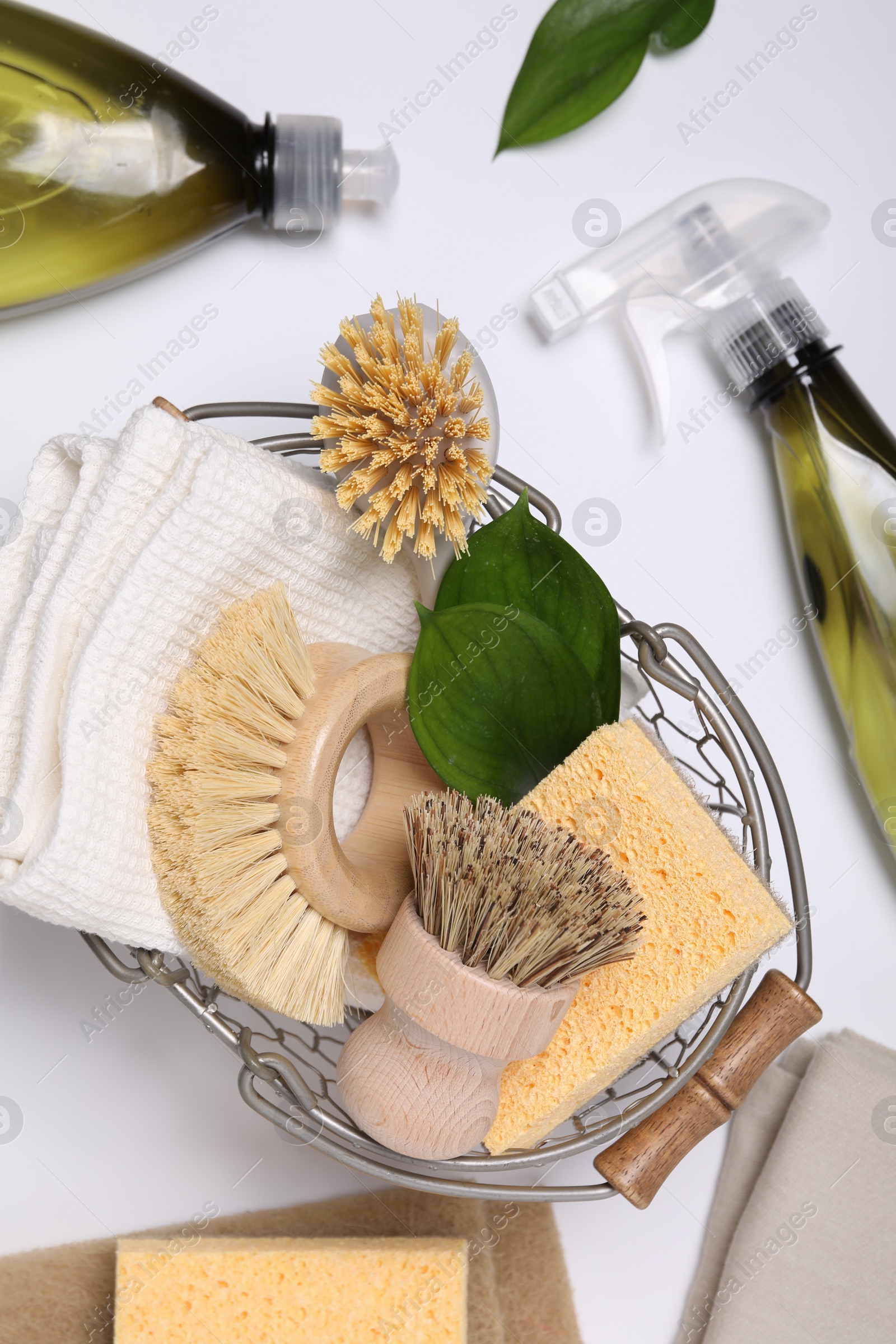 Photo of Flat lay composition with different cleaning supplies on white background