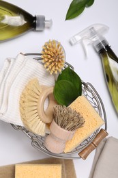 Flat lay composition with different cleaning supplies on white background