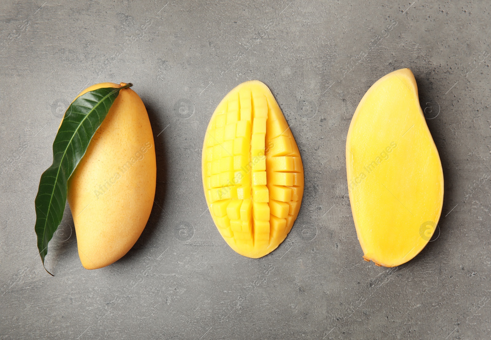 Photo of Flat lay composition with mango on grey background