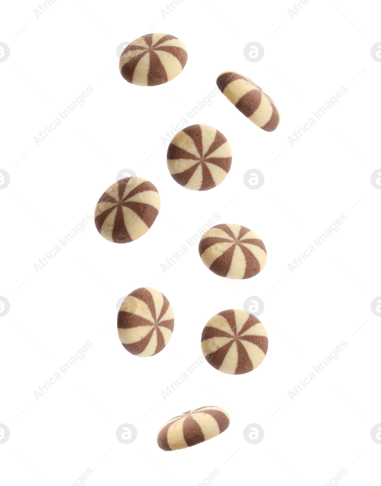 Image of Set of falling delicious striped cookies on white background  