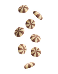 Image of Set of falling delicious striped cookies on white background  