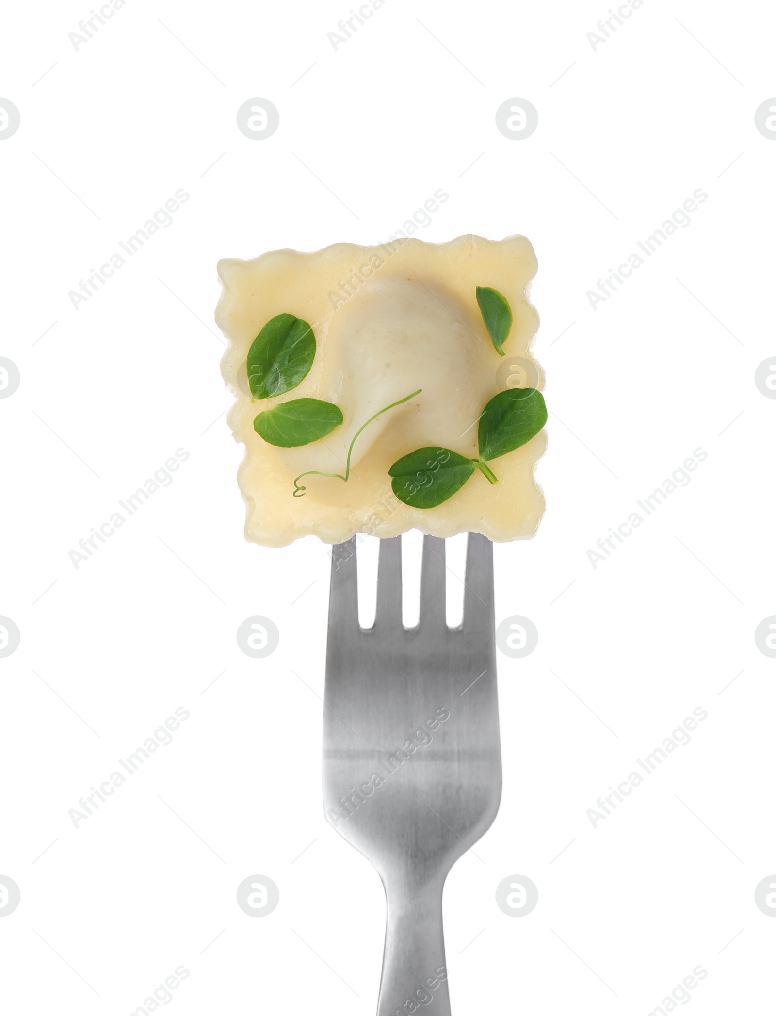 Photo of Fork with tasty ravioli isolated on white