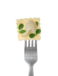 Fork with tasty ravioli isolated on white