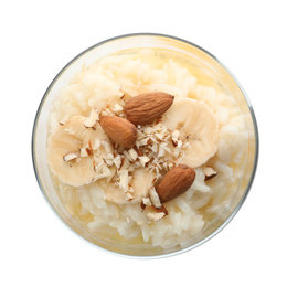 Photo of Delicious rice pudding with banana and almonds isolated on white, top view