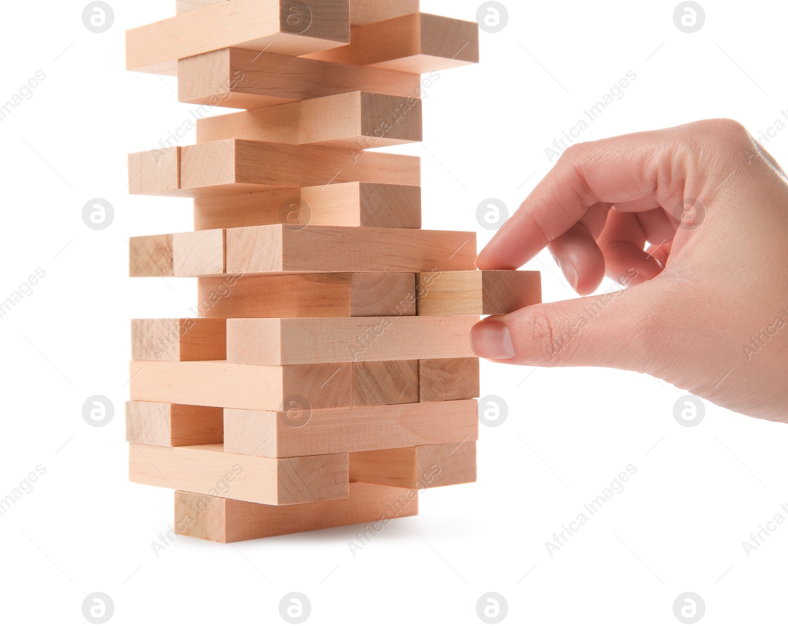 Photo of Woman playing Jenga on white background, closeup