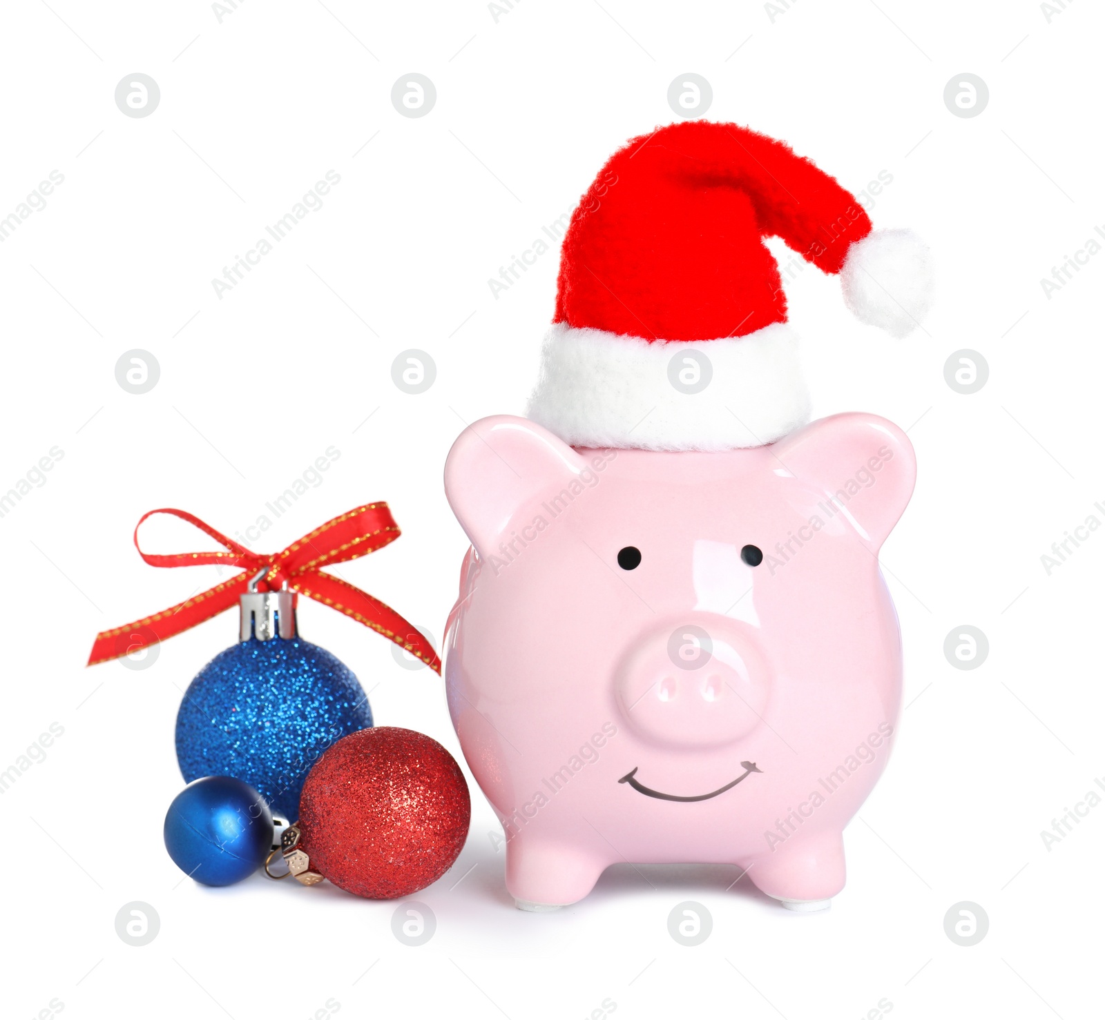 Photo of Composition with piggy bank and Christmas decor on white background