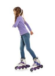 Little girl with inline roller skates on white background
