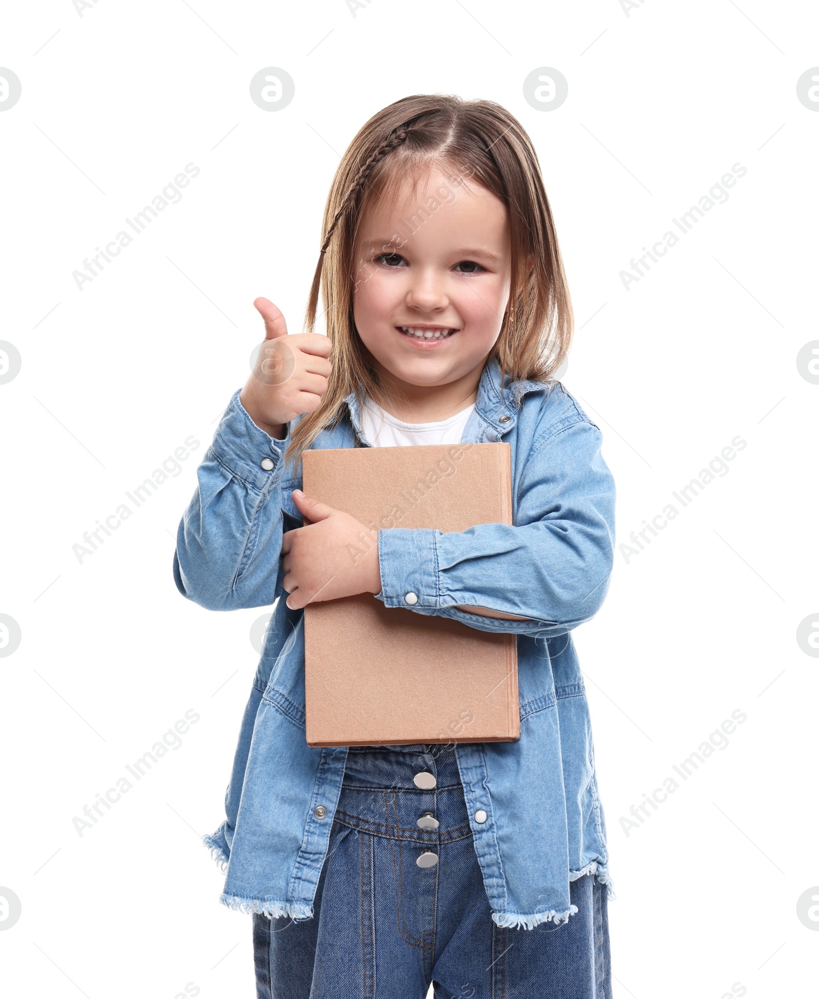 Photo of Cute little girl with book showing thumbs up against white background