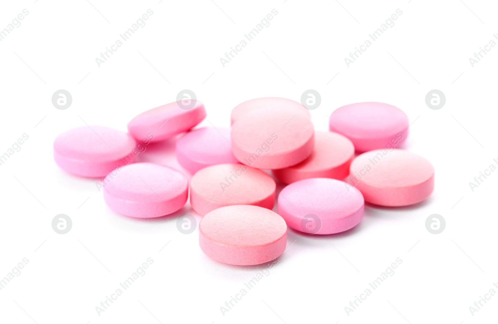 Photo of Color pills on white background. Medical care