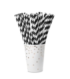 Photo of Striped paper cocktail tubes on white background