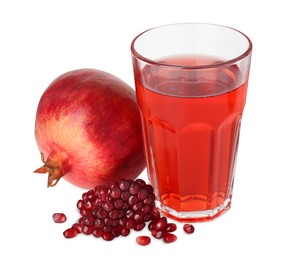 Photo of Refreshing pomegranate juice in glass, seeds and fruit isolated on white