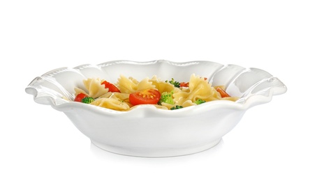 Photo of Tasty pasta salad with vegetables on white background