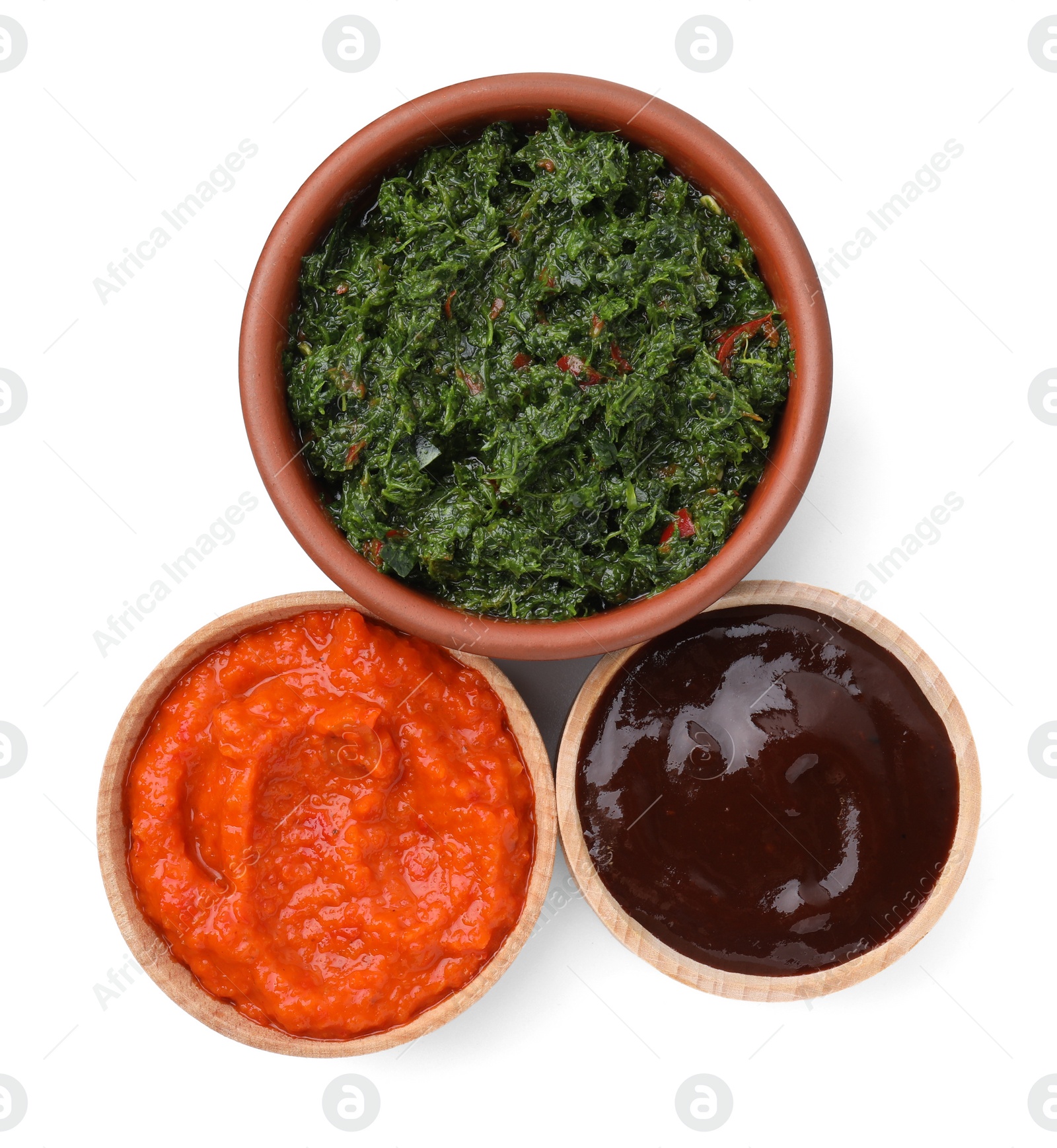 Photo of Different fresh marinades in bowls isolated on white, top view