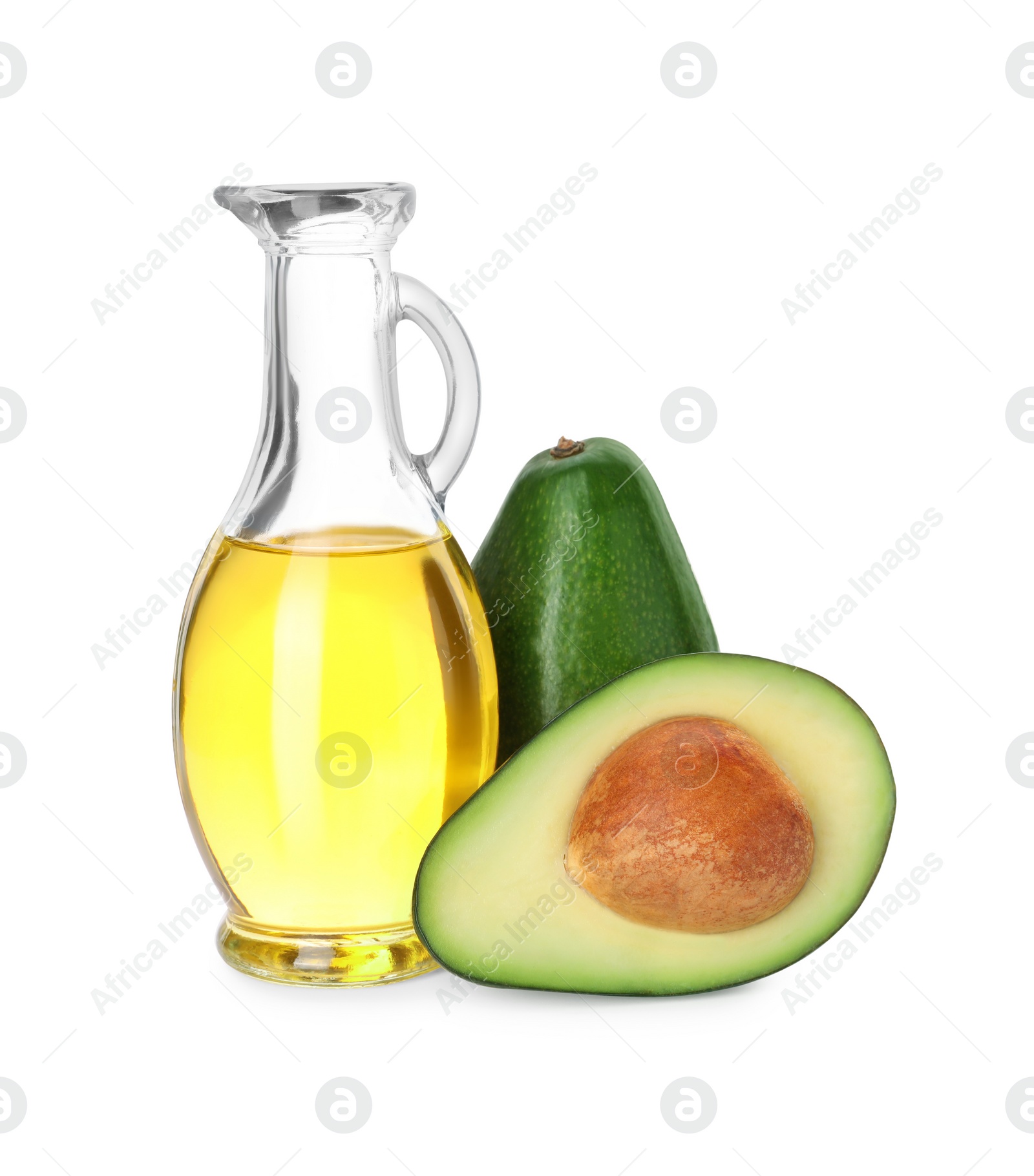 Photo of Cooking oil and fresh avocados isolated on white