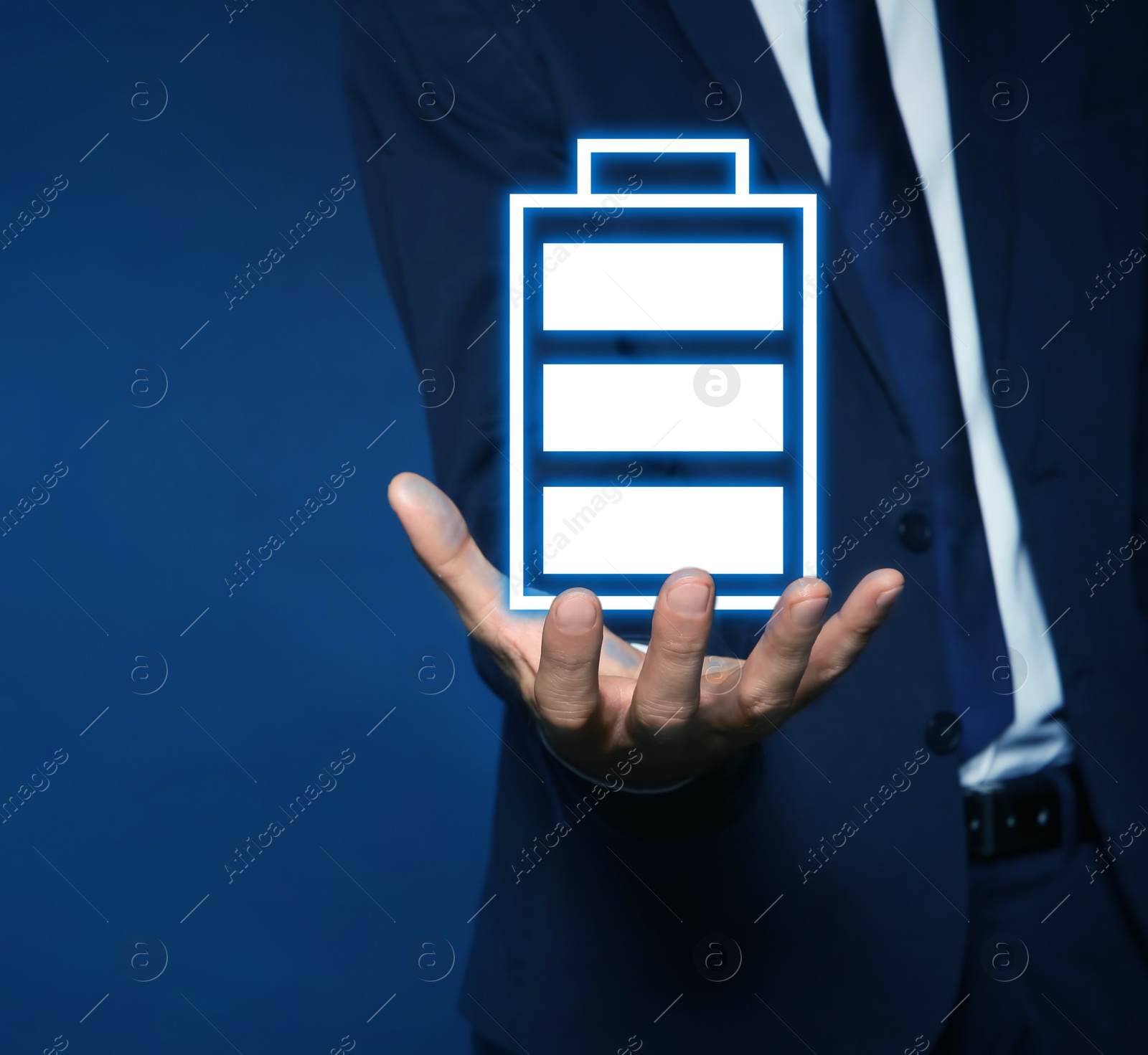 Image of Businessman demonstrating at icon of full battery on color background, closeup