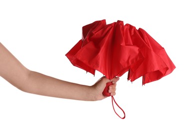 Photo of Woman with closed red umbrella on white background, closeup
