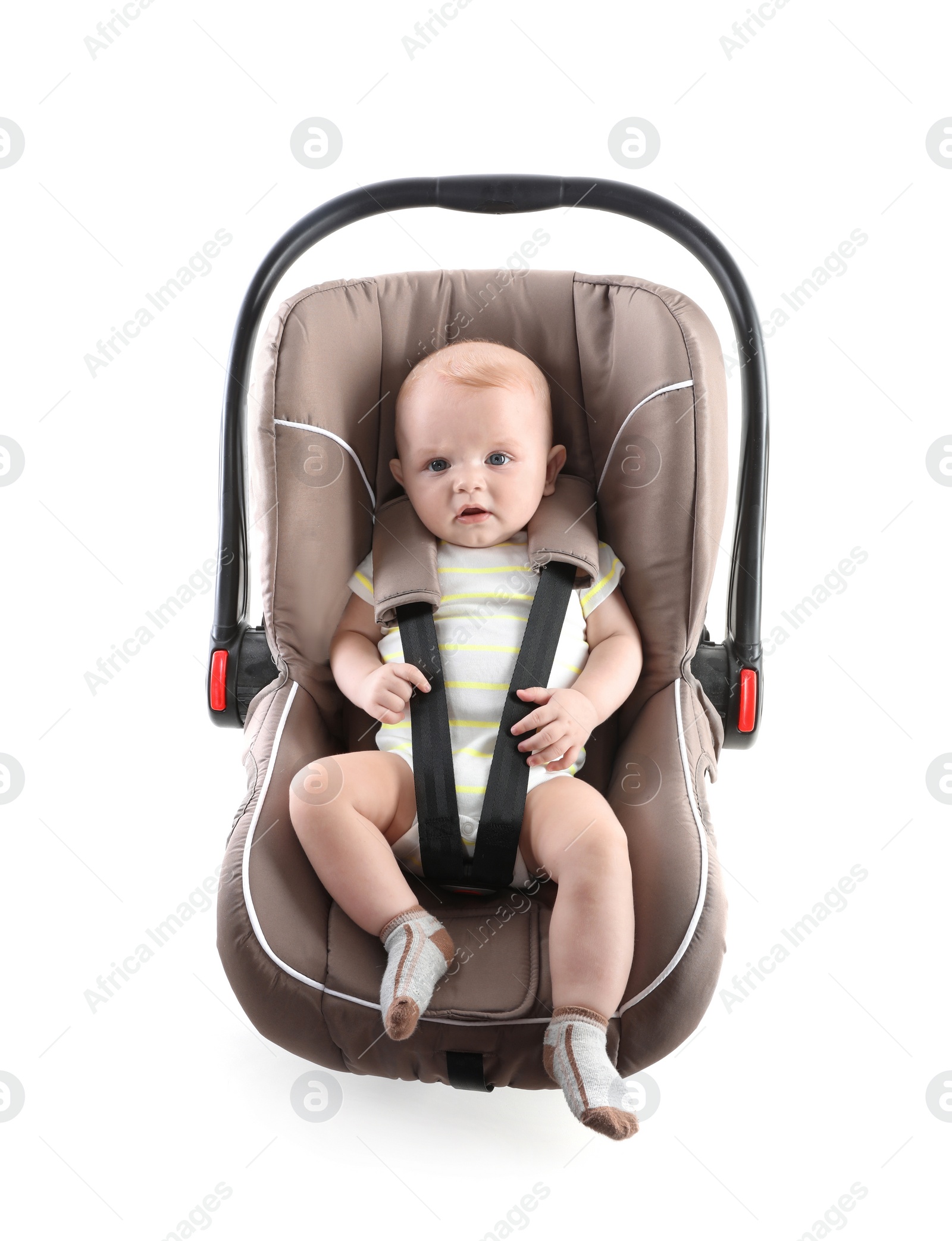 Photo of Adorable baby in child safety seat on white background