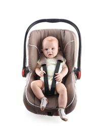 Photo of Adorable baby in child safety seat on white background