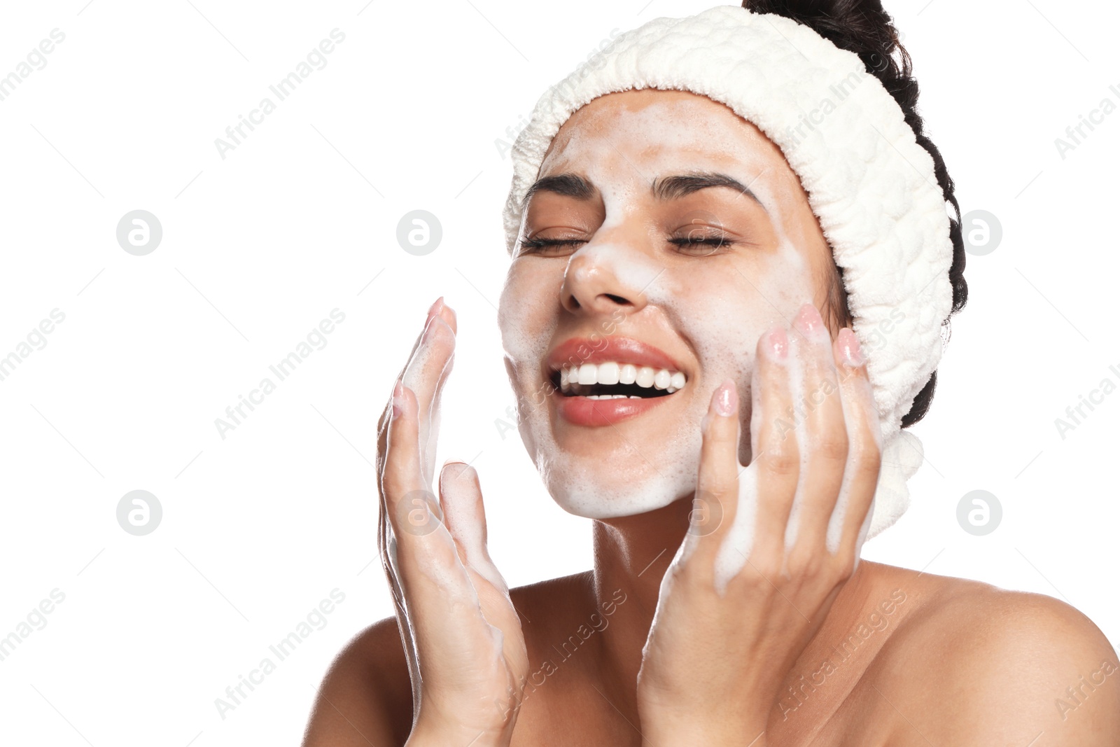 Photo of Beautiful woman applying facial cleansing foam on white background