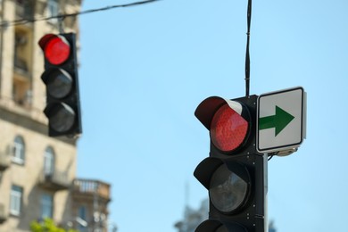 Photo of View of traffic light against blue sky, space for text