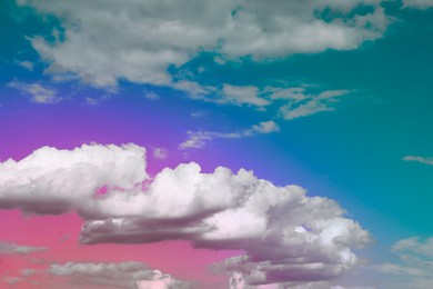 Magic sky with fluffy clouds toned in bright colors