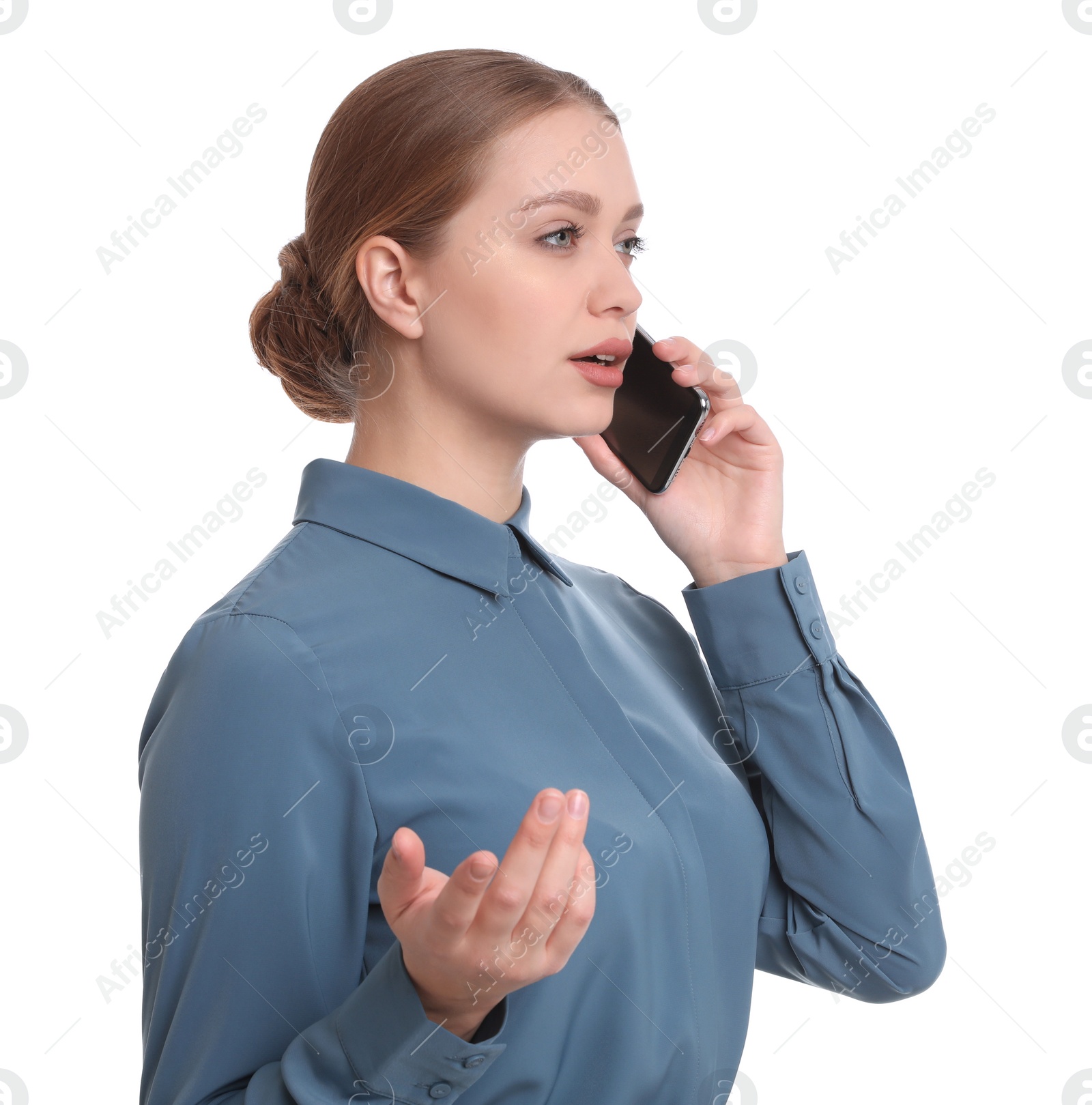 Photo of Young businesswoman talking on mobile phone against white background