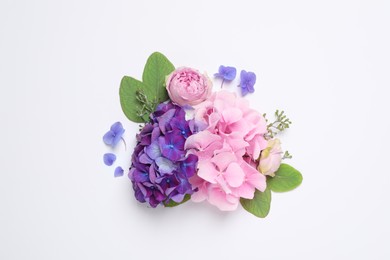 Beautiful composition with hortensia flowers on white background, flat lay