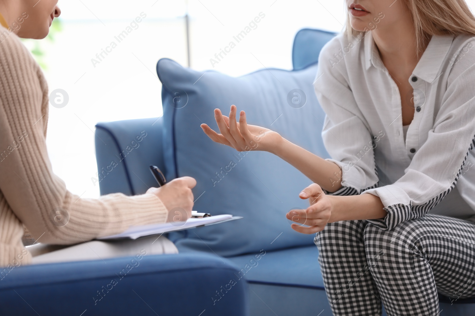 Photo of Young woman with problems at psychologist office