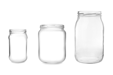 Image of Set with open empty glass jars on white background