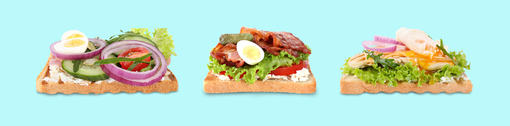 Set of different yummy sandwiches on light blue background. Banner design