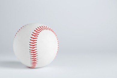 Photo of Baseball ball on white background, space for text. Sports game