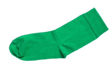 Photo of New green sock isolated on white, top view
