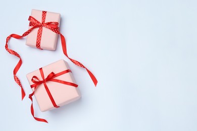 Photo of Beautiful gift boxes on white background, top view