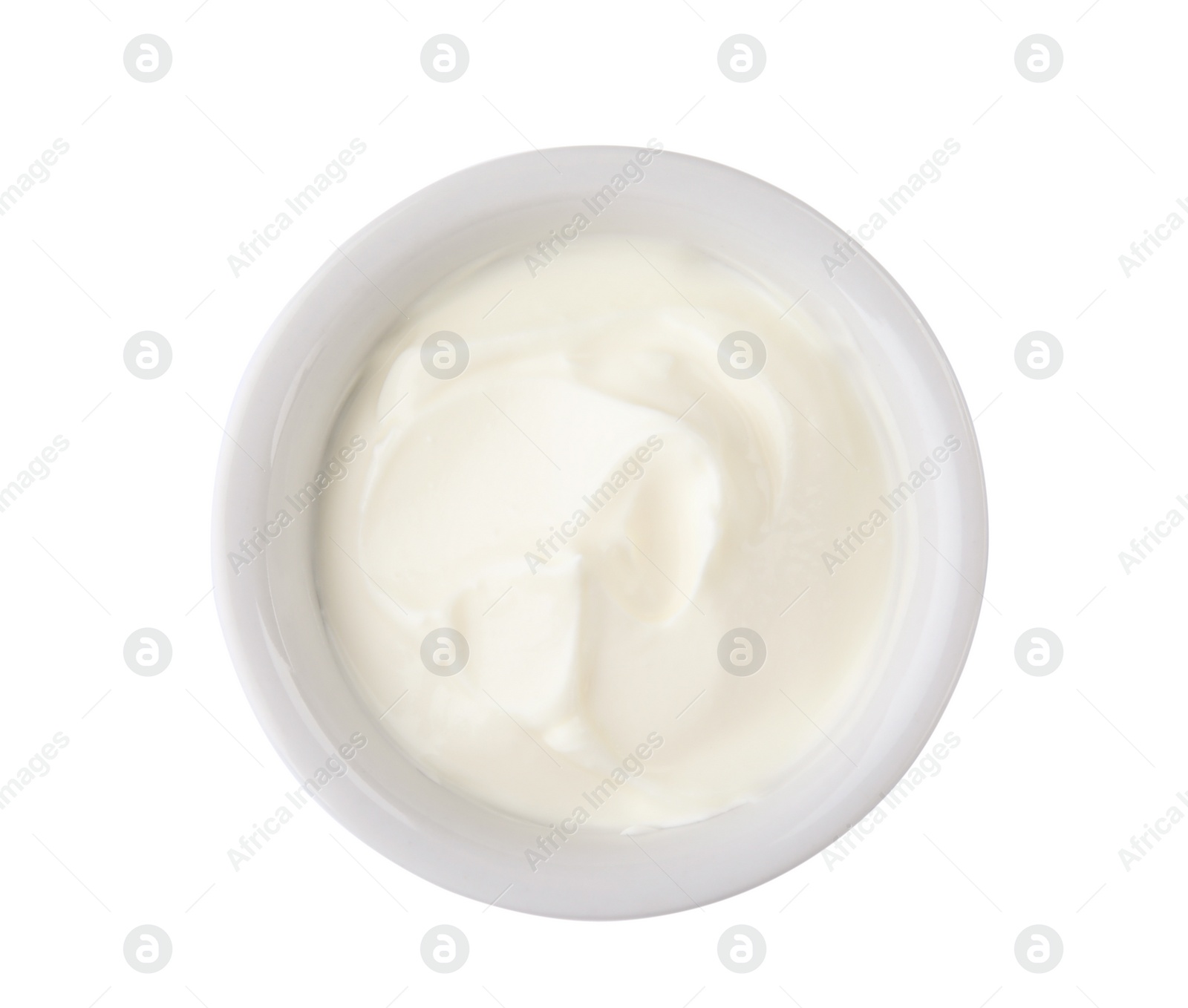 Photo of Bowl with sour cream on white background, top view