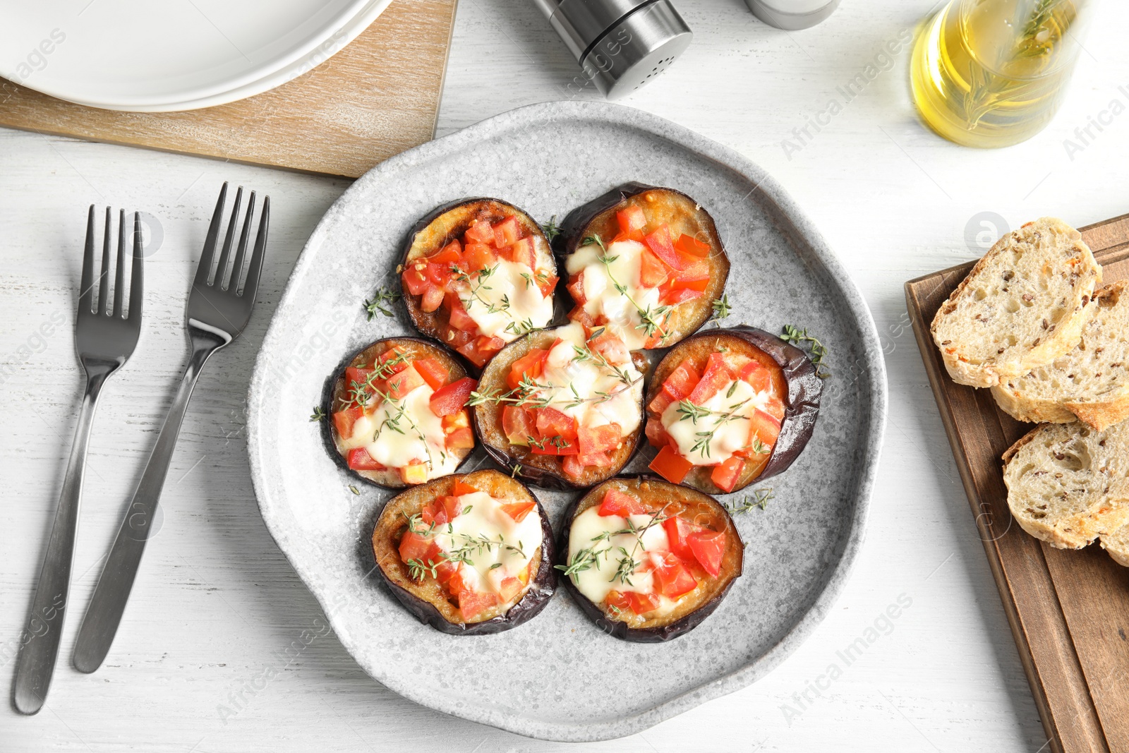 Photo of Flat lay composition with baked eggplant, tomatoes and cheese on table