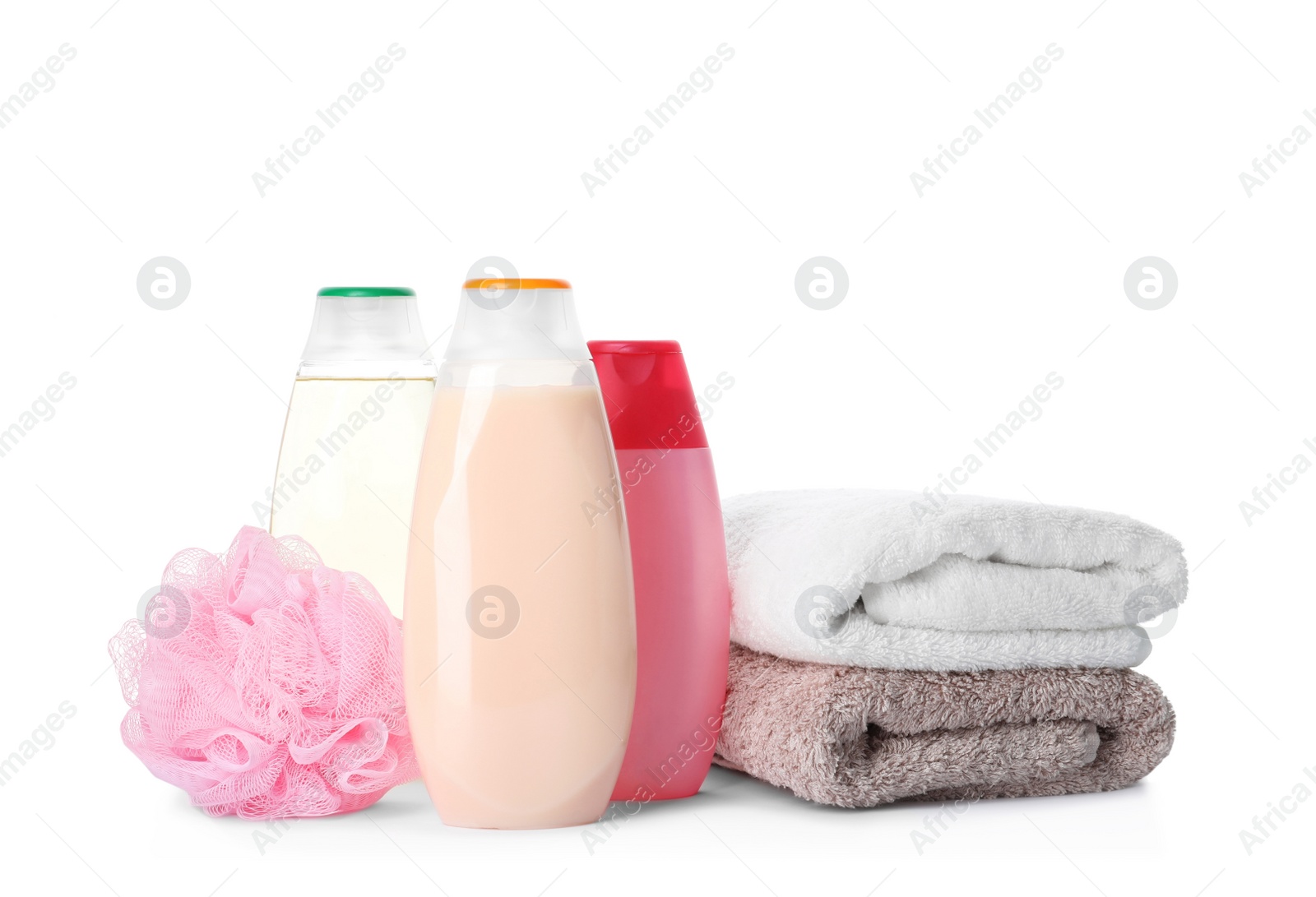 Photo of Personal hygiene products, shower puff and towels on white background