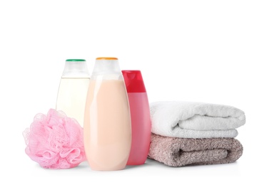 Photo of Personal hygiene products, shower puff and towels on white background