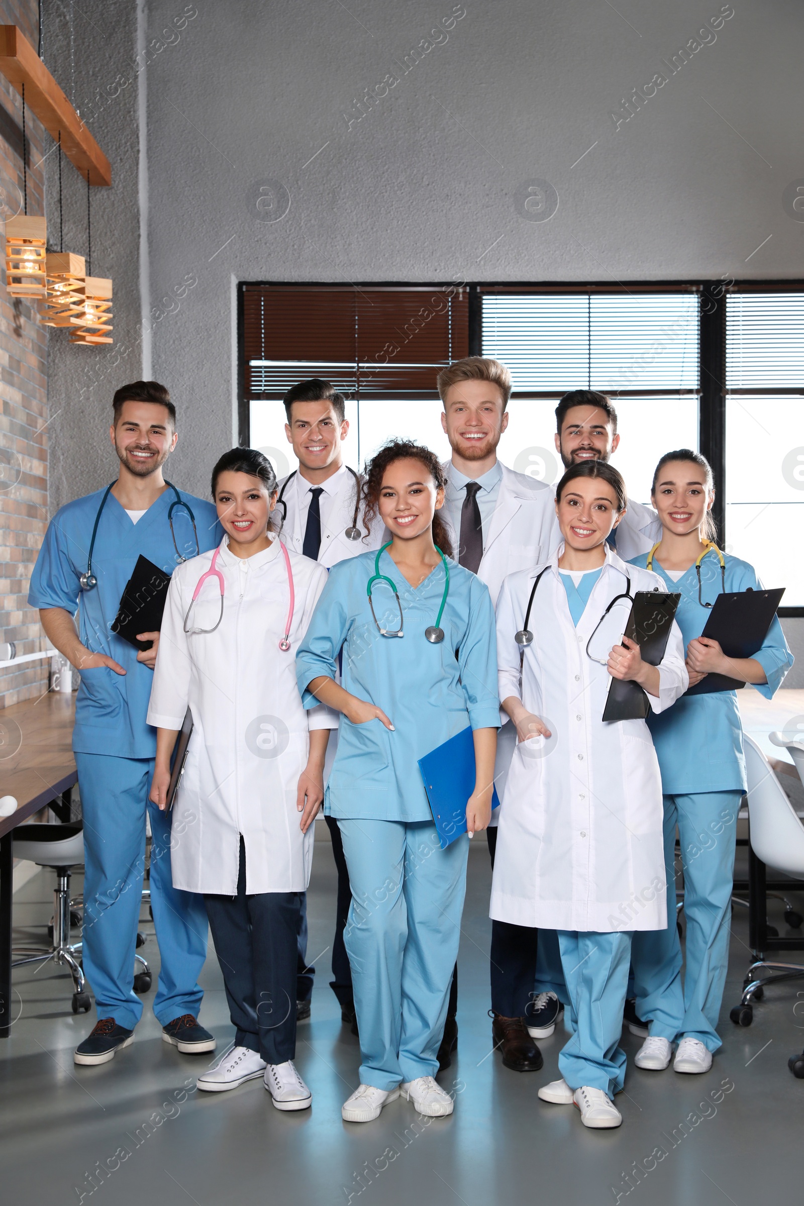 Photo of Team of medical workers in hospital. Unity concept