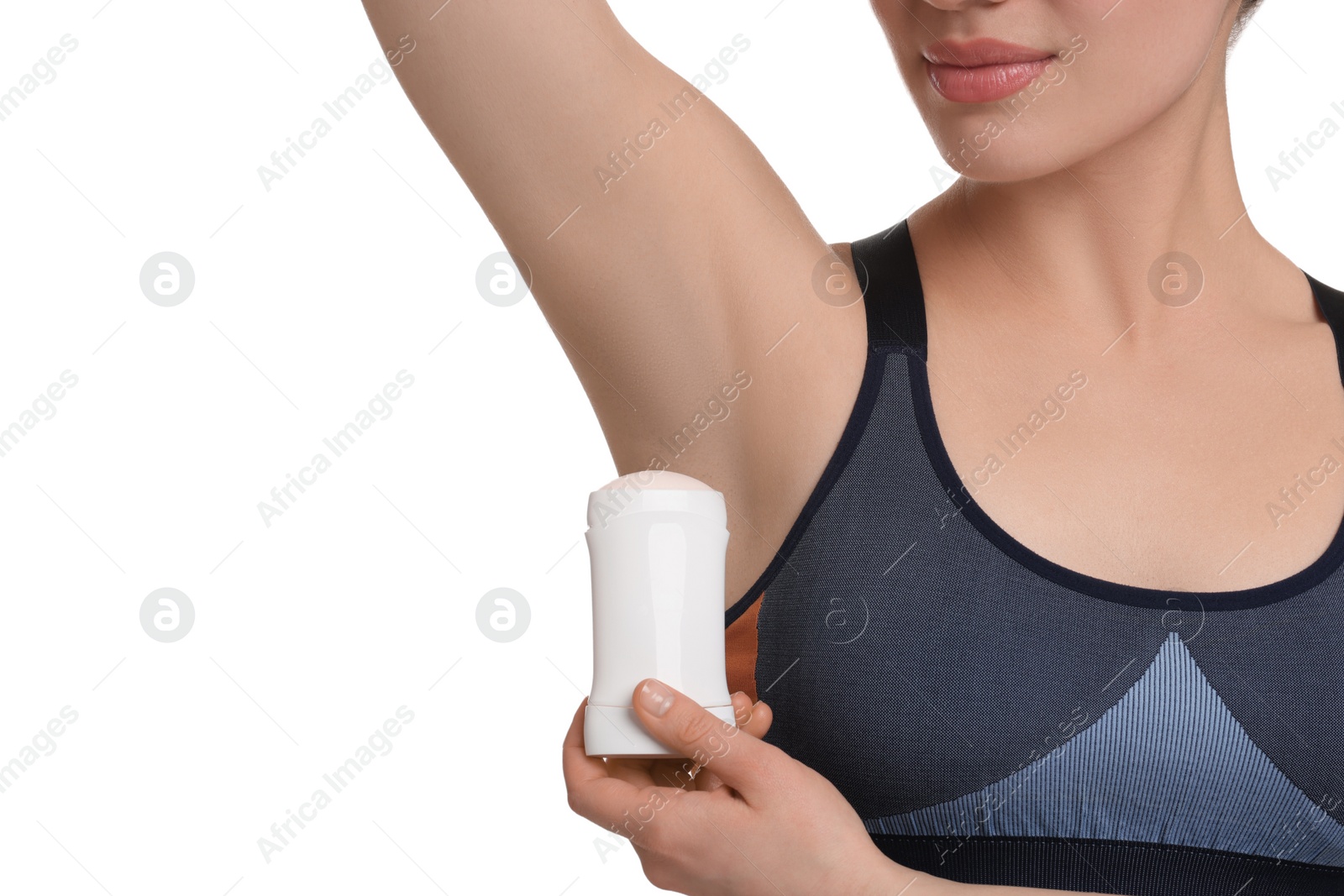 Photo of Woman applying deodorant on white background, closeup